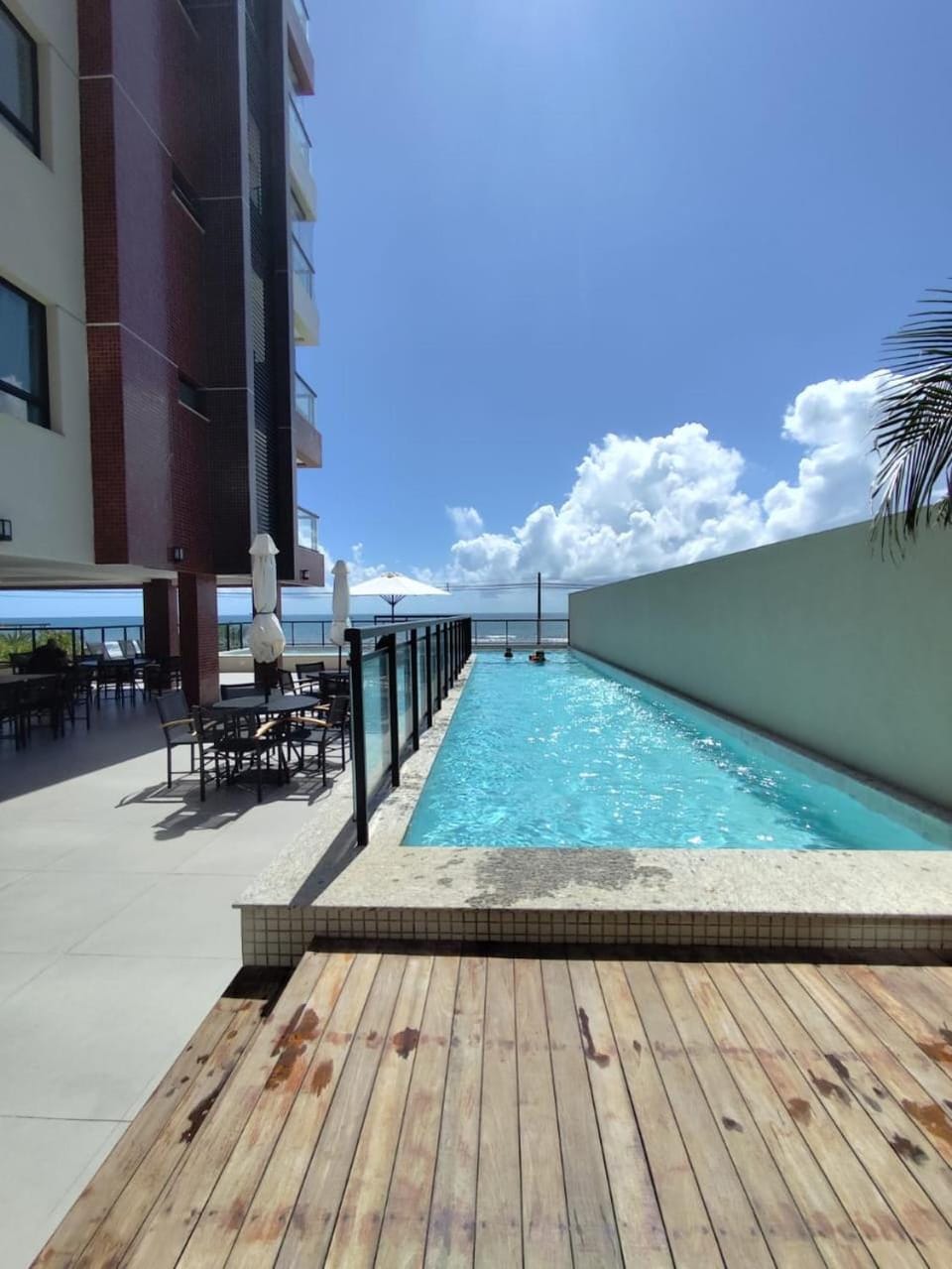 Patio, Day, View (from property/room), Pool view, Sea view, Swimming pool, sunbed