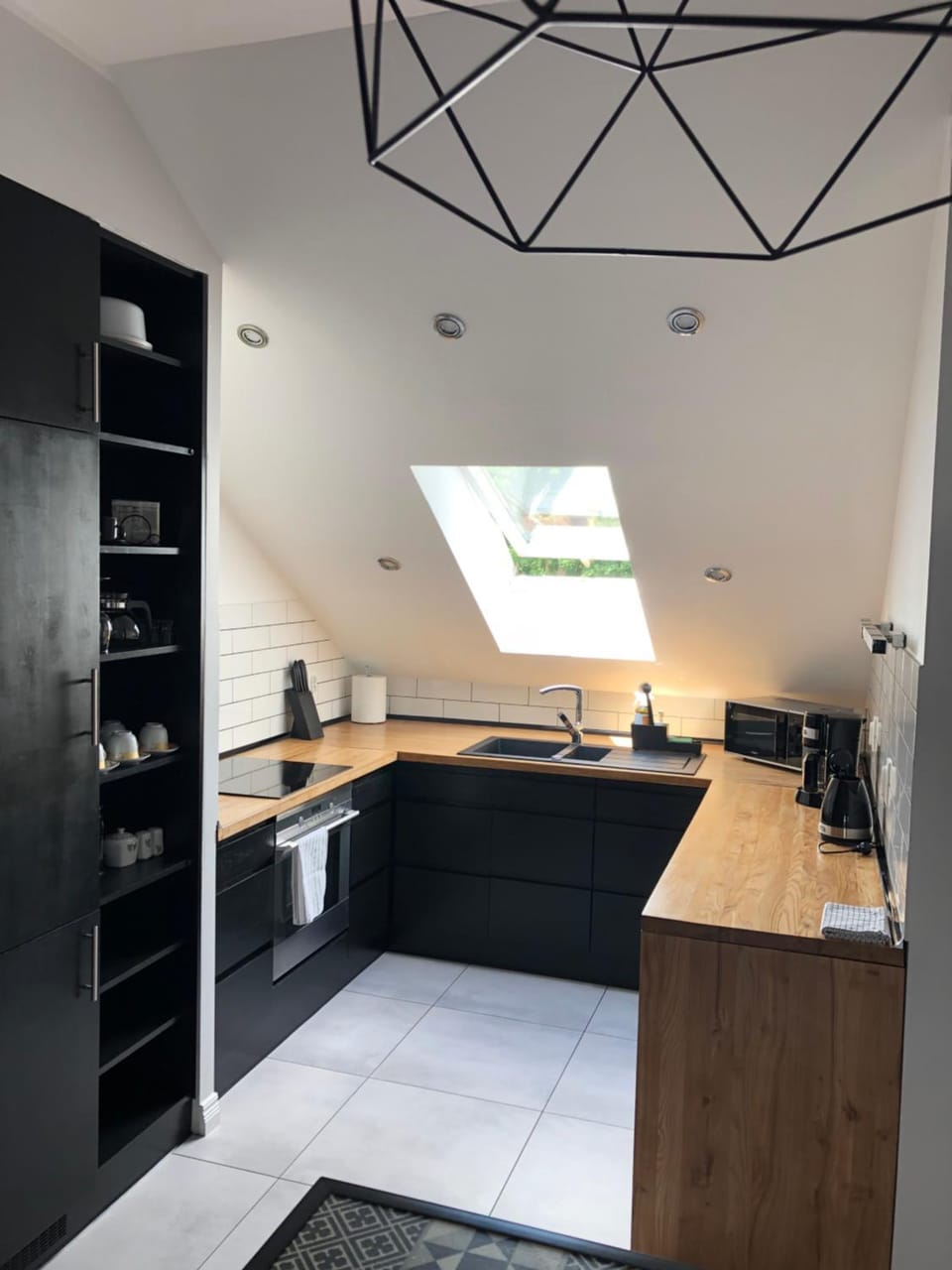 Kitchen or kitchenette, microwave, oven, stove