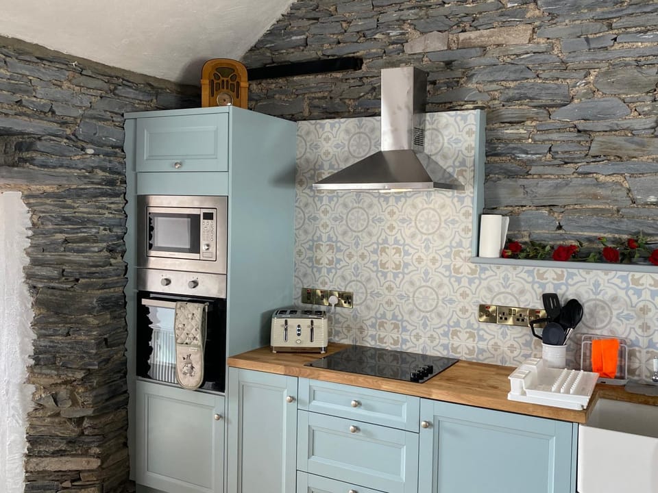 Kitchen or kitchenette, oven, stove, toaster