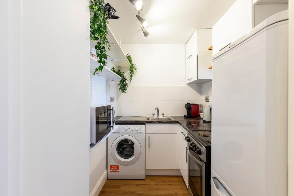 Kitchen or kitchenette, microwave, washing machine, kitchen