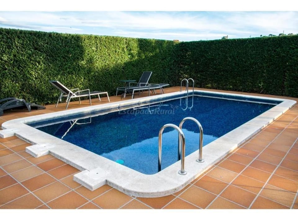 Property building, Living room, Swimming pool