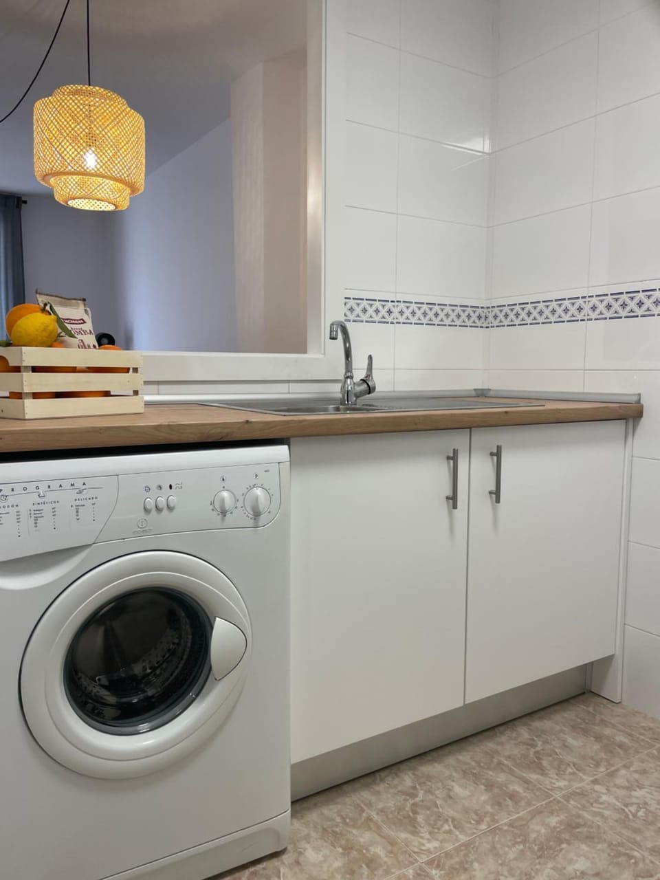 Kitchen or kitchenette, washing machine