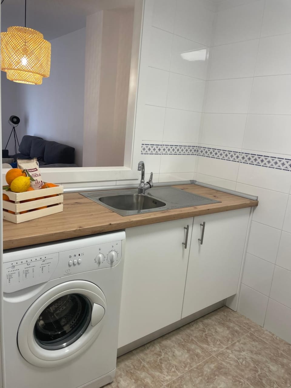 Kitchen or kitchenette, washing machine