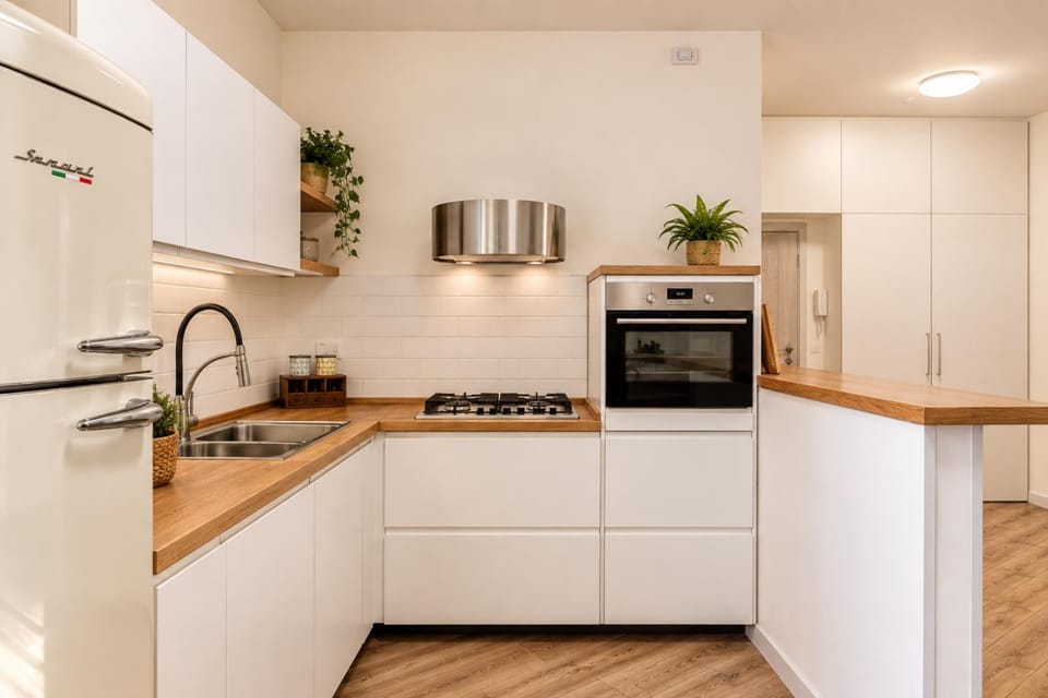 Kitchen or kitchenette, dishwasher, oven, stove
