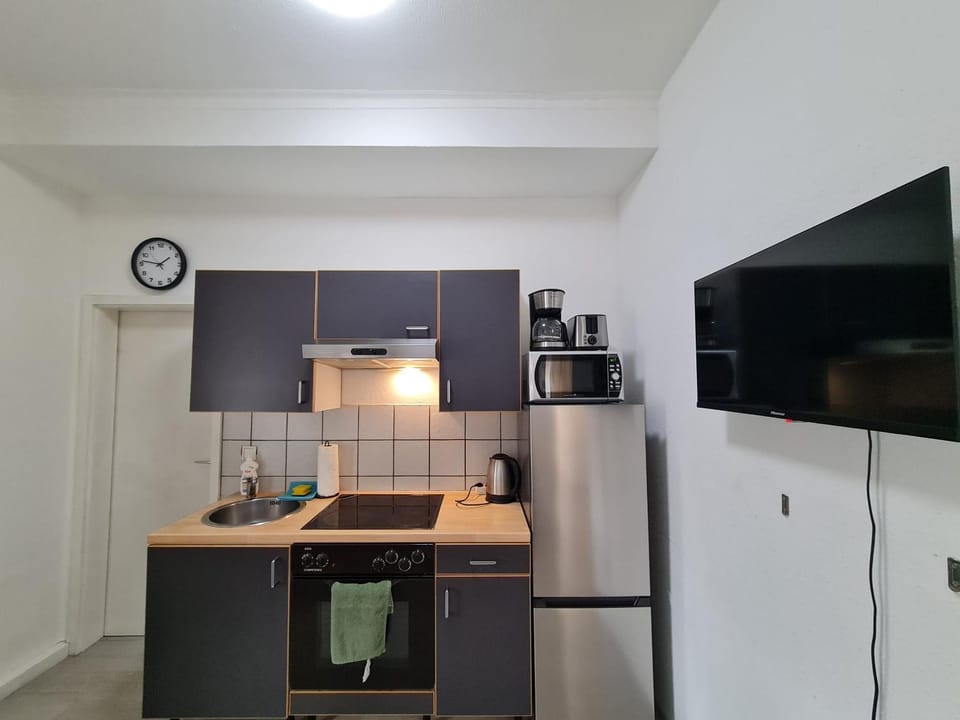 Kitchen or kitchenette, oven, stove, toaster