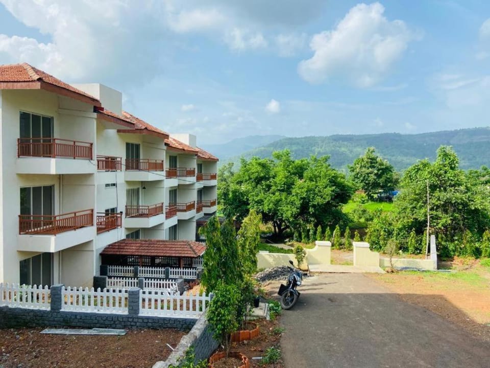Property building, Spring, Day, Neighbourhood, Natural landscape, Mountain view