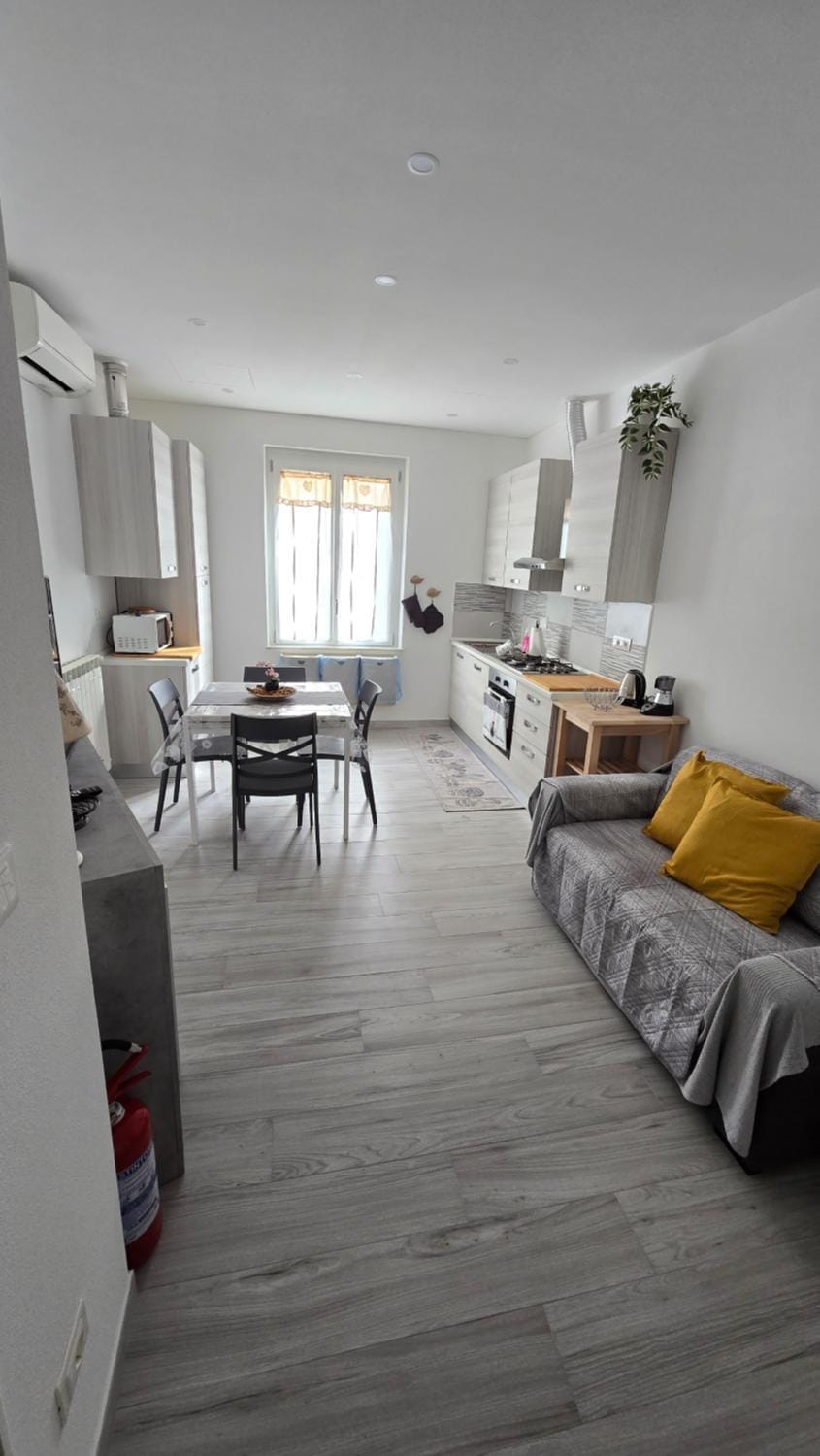 Kitchen or kitchenette, Living room, Seating area, Dining area, air conditioner