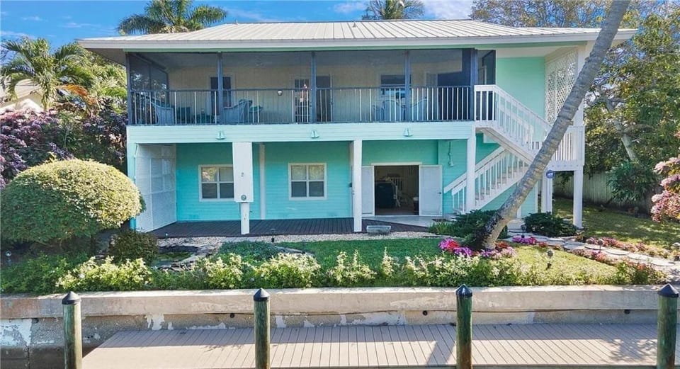 Green Turtle Boathouse HOT TUB view of the canal House in East Naples