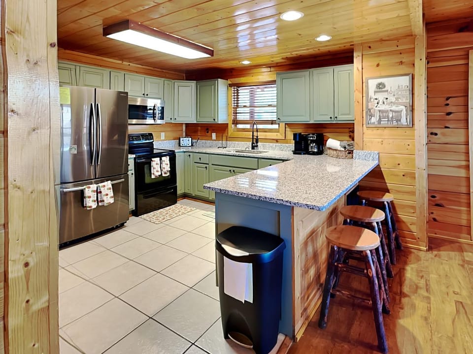 Kitchen or kitchenette, microwave, oven, stove, kitchen