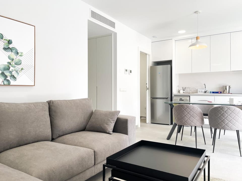Kitchen or kitchenette, Living room, Seating area, Dining area