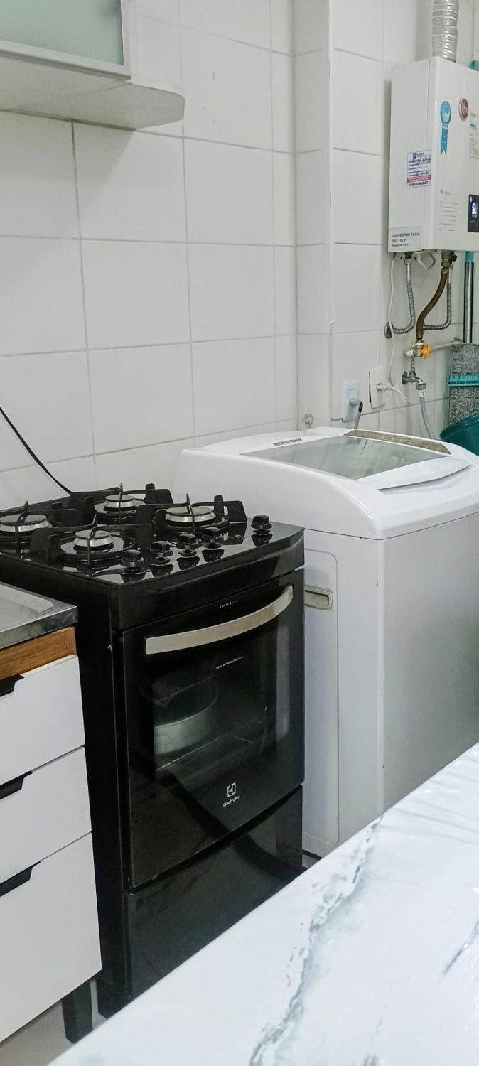 Apê a 300 metros da praia, 2dorm, garagem, elevador Apartment in State of São Paulo