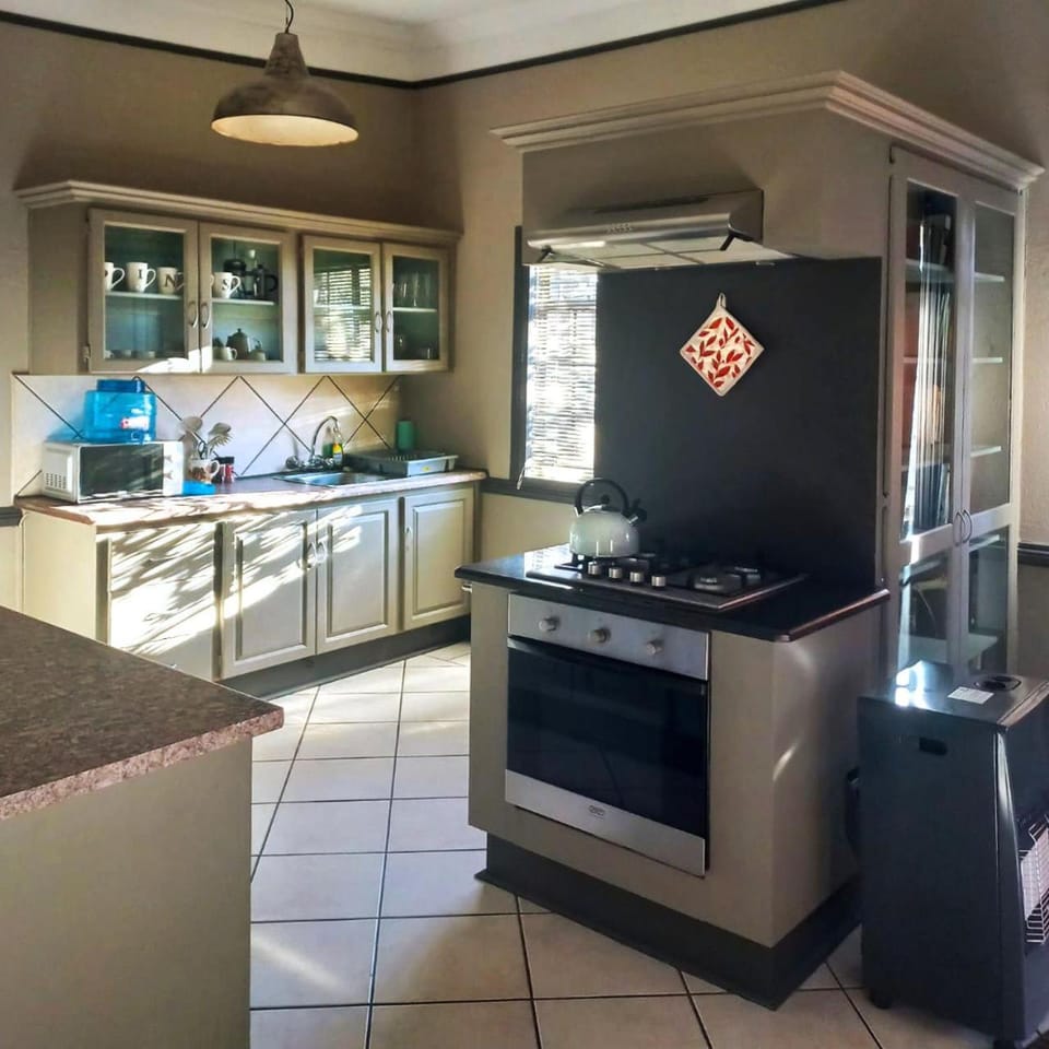 Kitchen or kitchenette, oven, stove