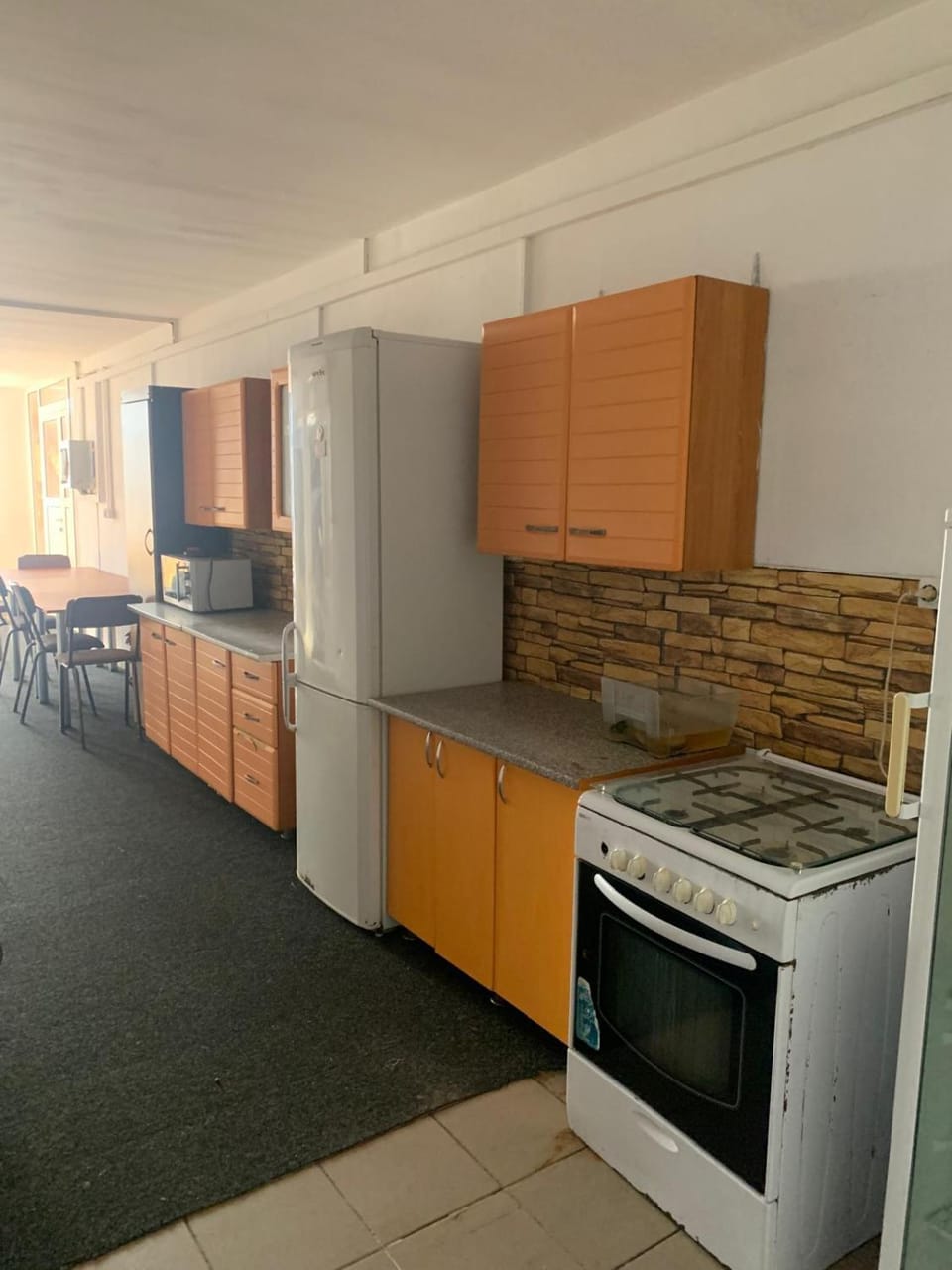 Kitchen or kitchenette, oven, stove
