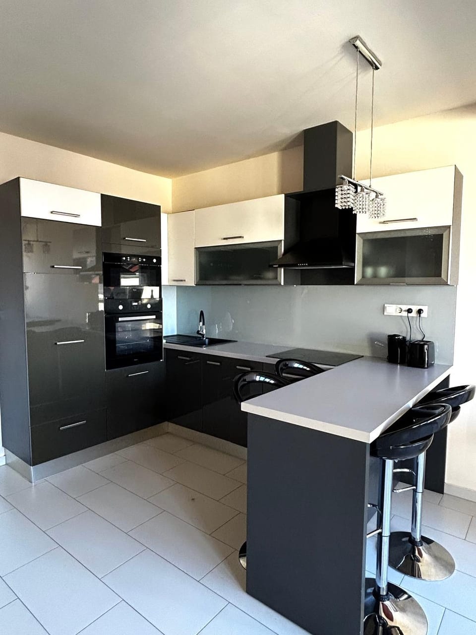Kitchen or kitchenette, oven, stove