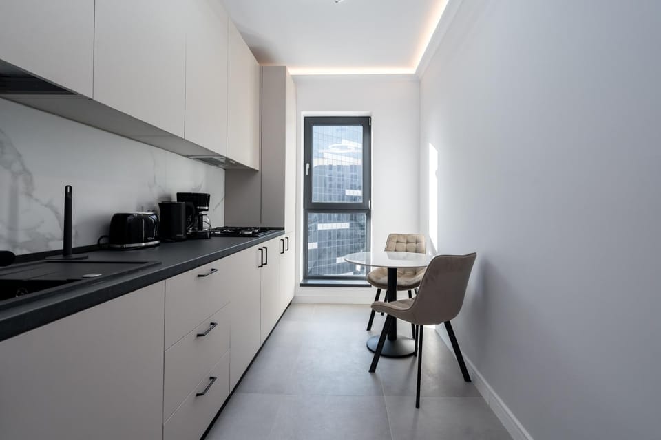 Kitchen or kitchenette, Living room, Seating area, Dining area, stove