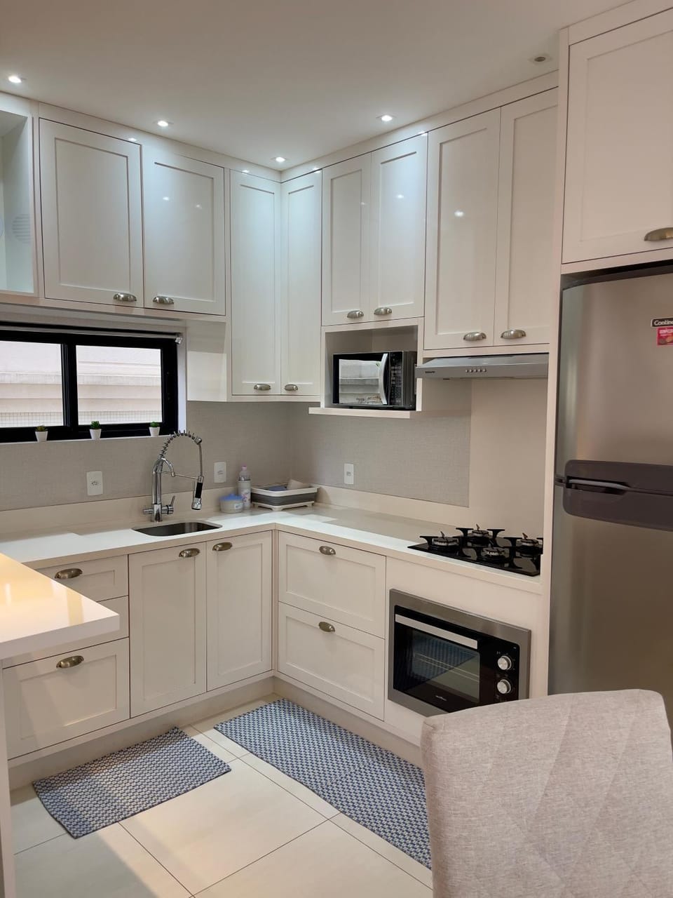 Kitchen or kitchenette, oven, stove