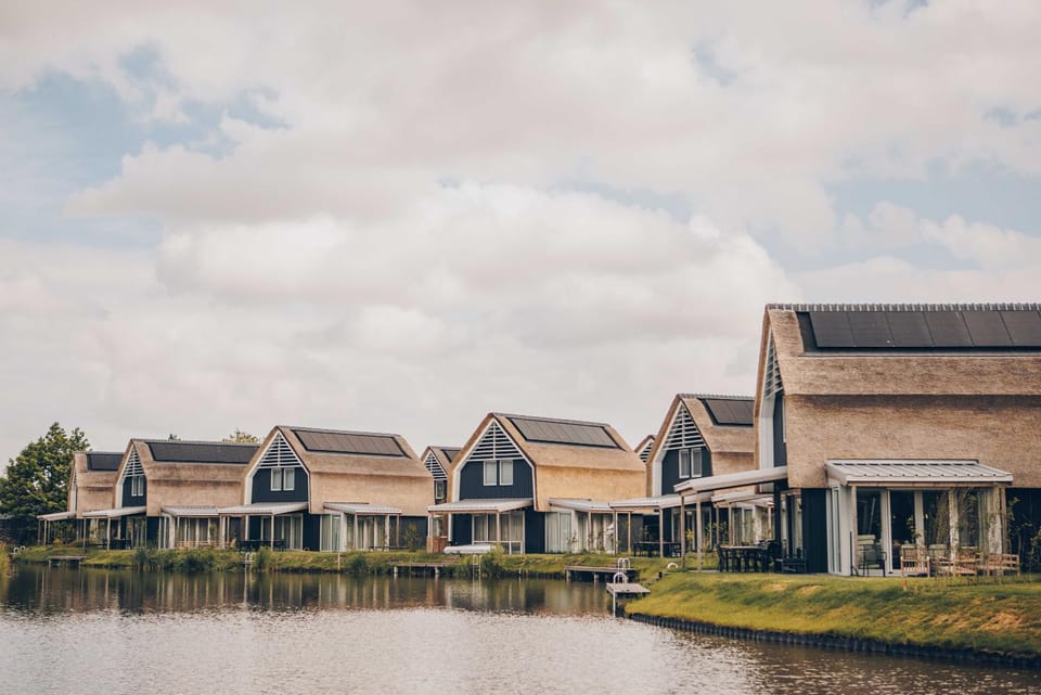 Luxury Waterfront Villa in Heeg for 8 Guests with Sauna & Private Dock on the Heegermeer House in Friesland, Netherlands