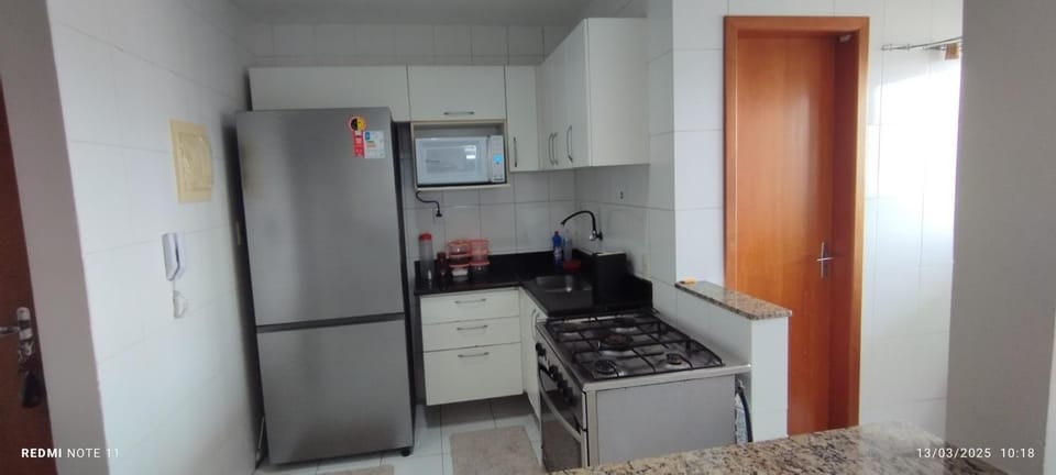 Kitchen or kitchenette, oven, stove