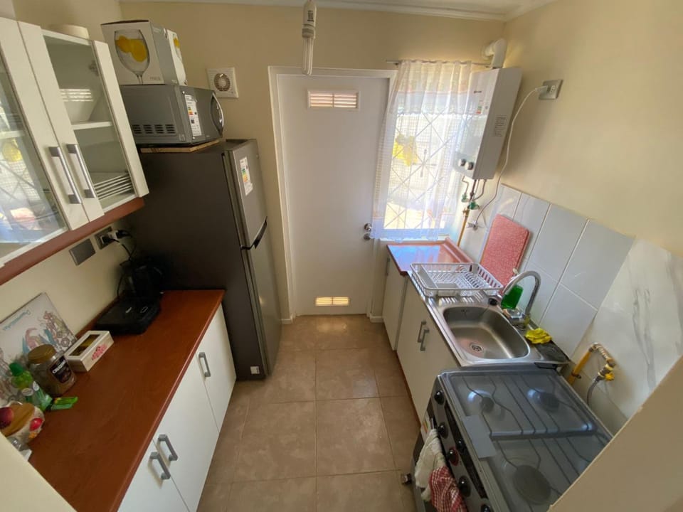 Kitchen or kitchenette, Communal kitchen, dishwasher, oven, stove, toaster