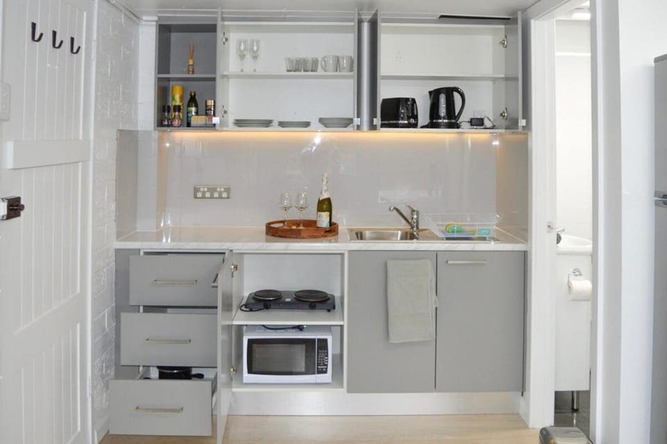 Kitchen or kitchenette, stove