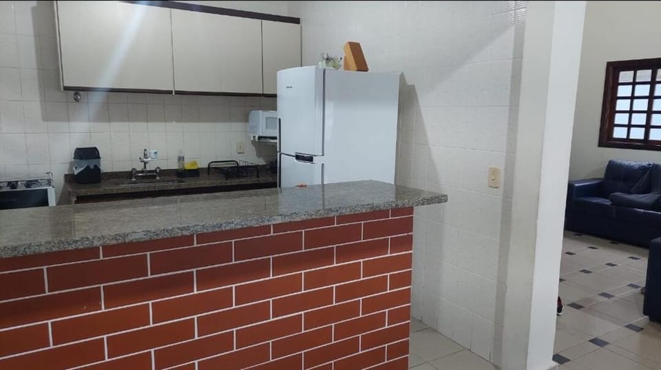 Casa no módulo 3 da Riviera de São Lourenço com churrasqueira e piscina privativas, 300m da praia House in Bertioga