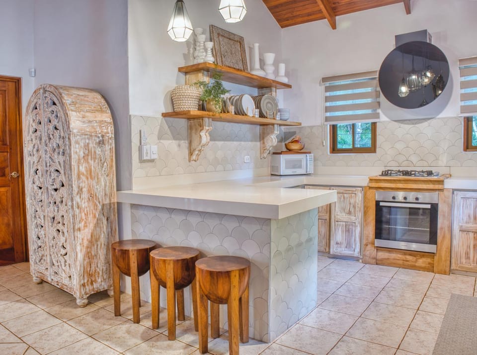 Kitchen or kitchenette, oven, stove
