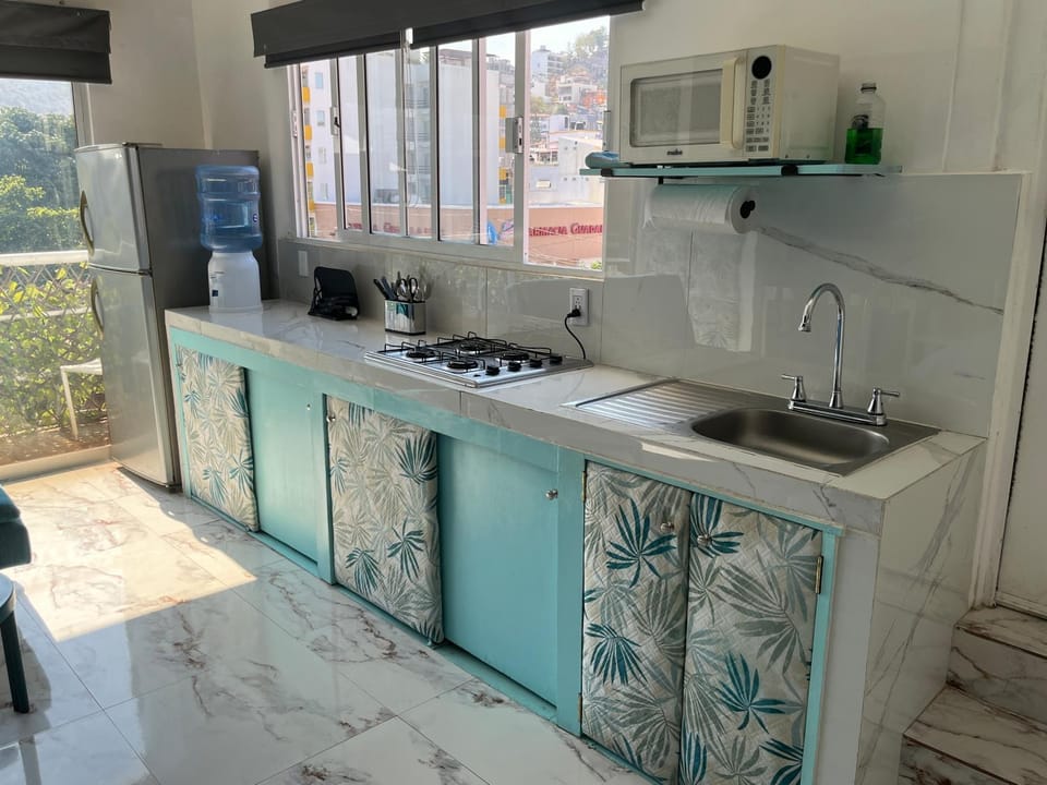 Kitchen or kitchenette, microwave