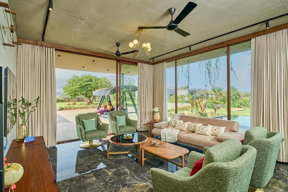 Living room, Seating area, Garden view, air conditioner