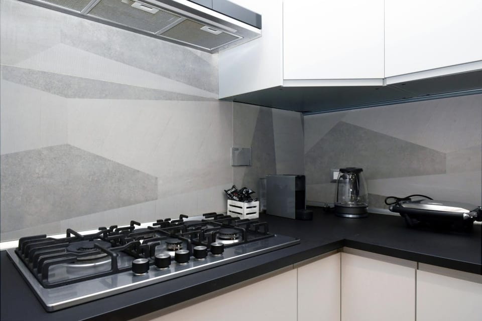 Kitchen or kitchenette, stove, toaster