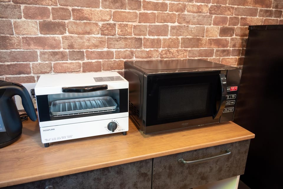 Kitchen or kitchenette, toaster