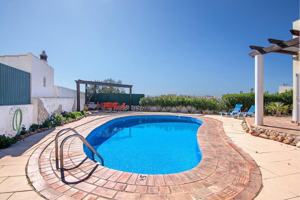 Property building, Living room, Swimming pool
