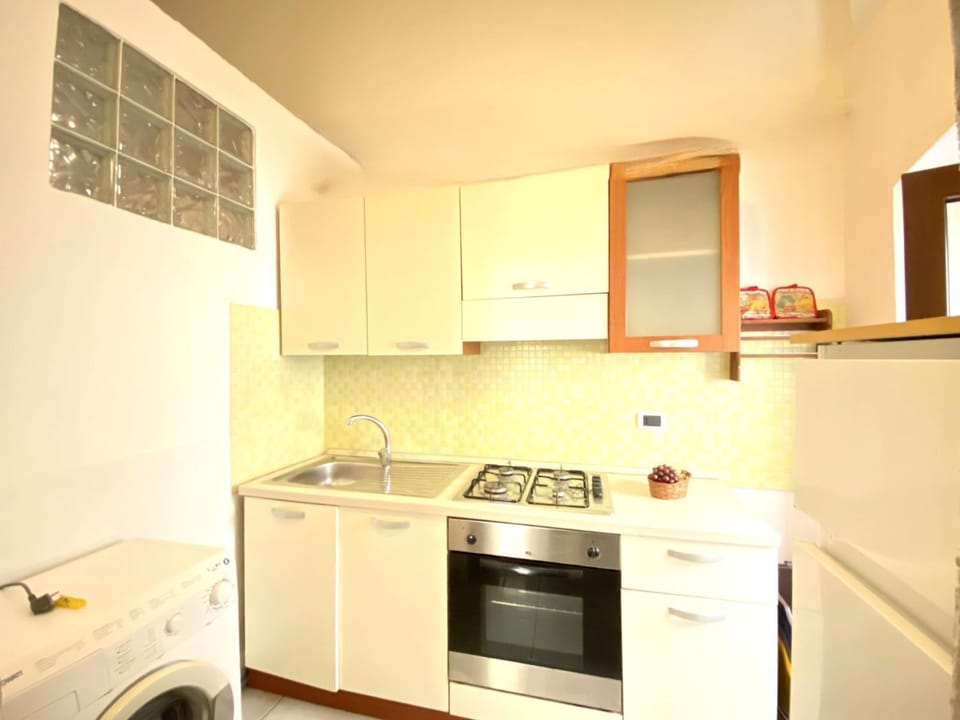 Kitchen or kitchenette, dishwasher, oven, stove, washing machine, dryer, kitchen