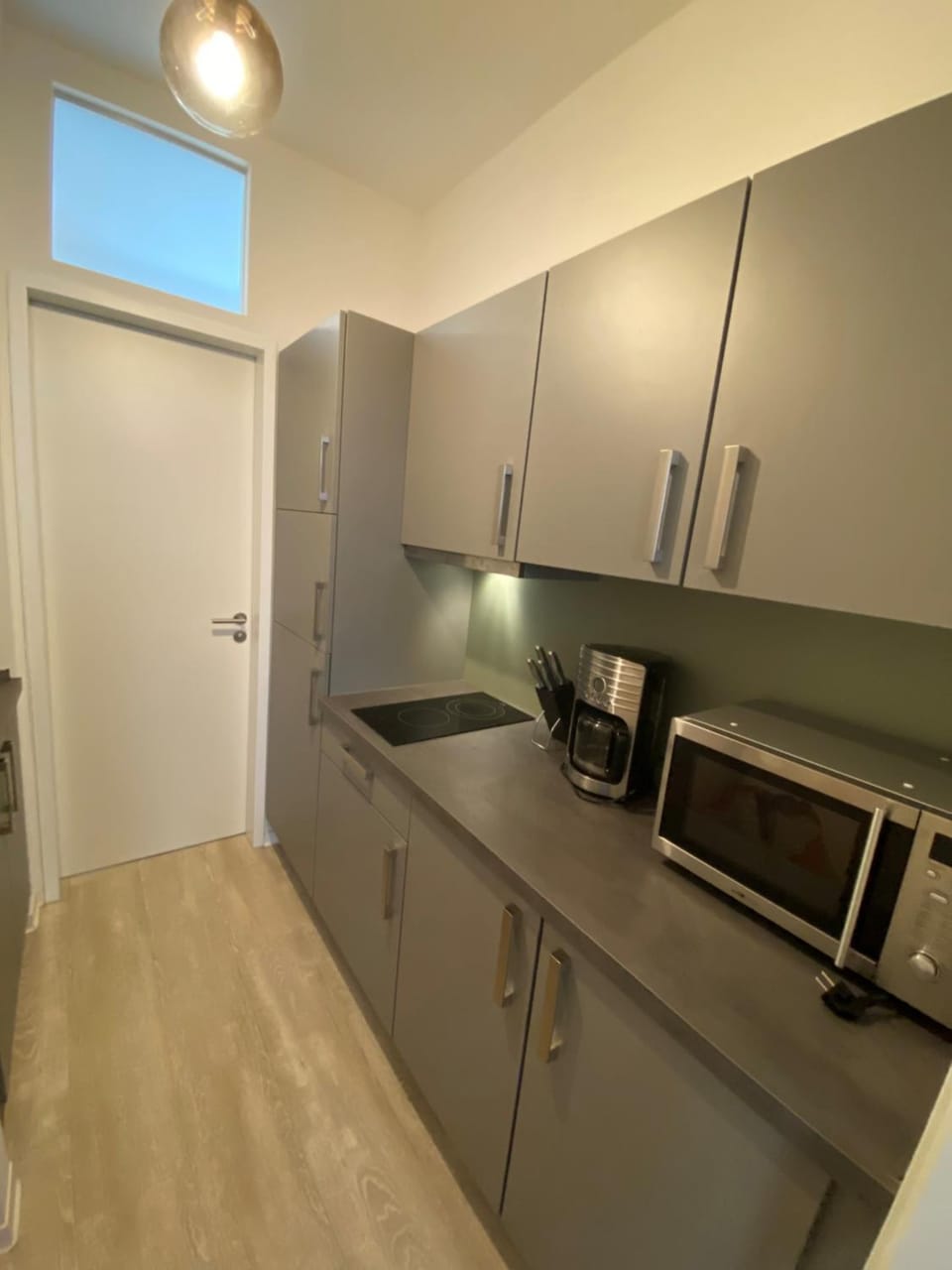 Kitchen or kitchenette, oven, stove