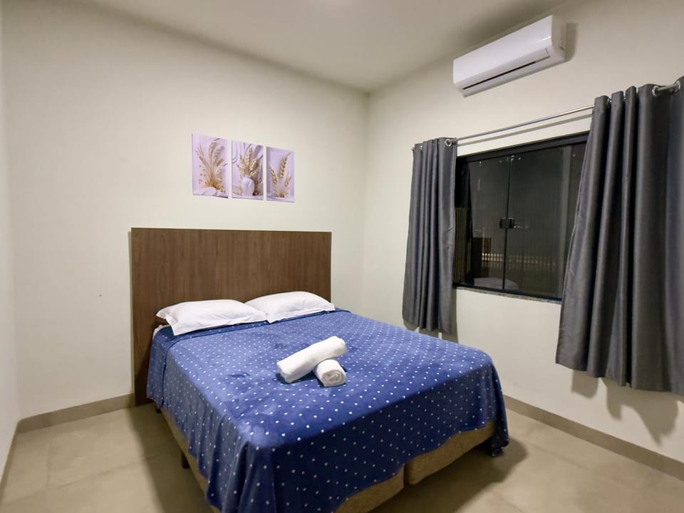 Bed, Photo of the whole room, Bedroom, towels, air conditioner