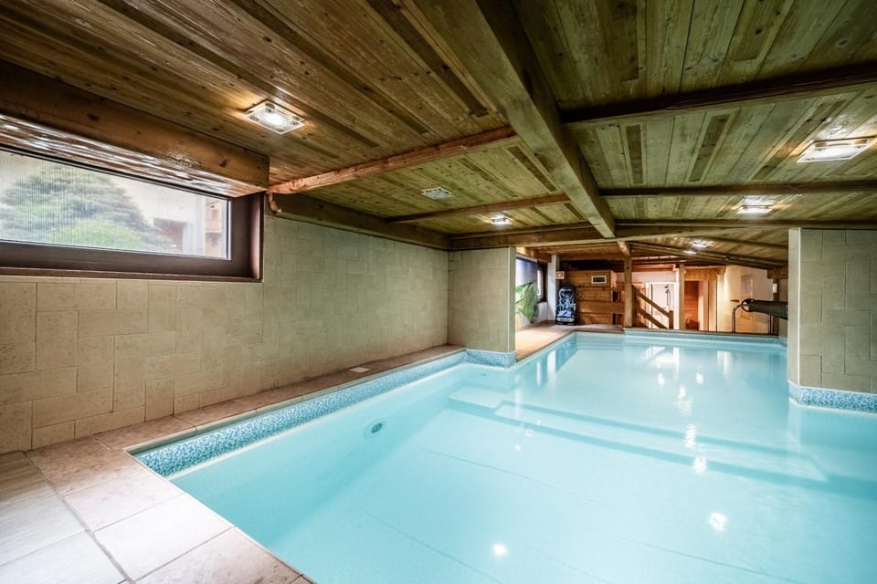 Property building, Living room, Swimming pool
