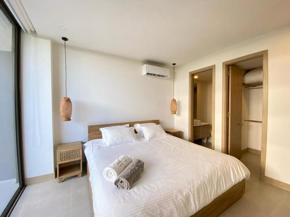 Bed, Photo of the whole room, Bedroom, towels, air conditioner