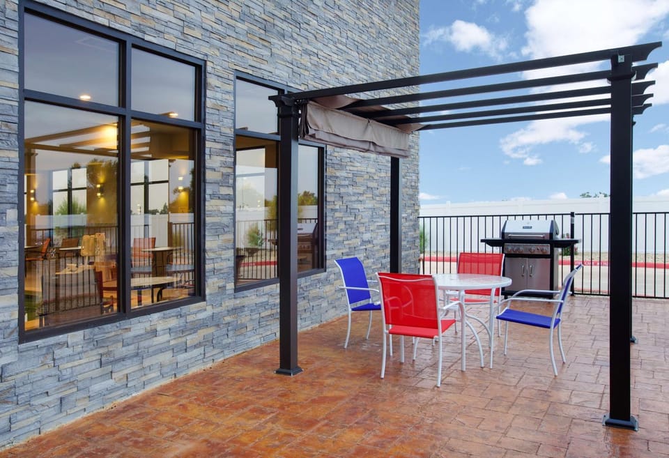 Property building, BBQ facilities, View (from property/room), Balcony/Terrace, Seating area