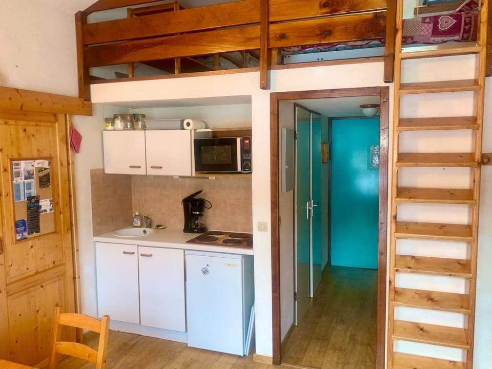 Kitchen or kitchenette, stove