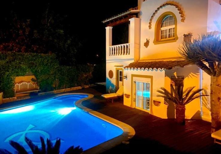 Property building, Living room, Swimming pool