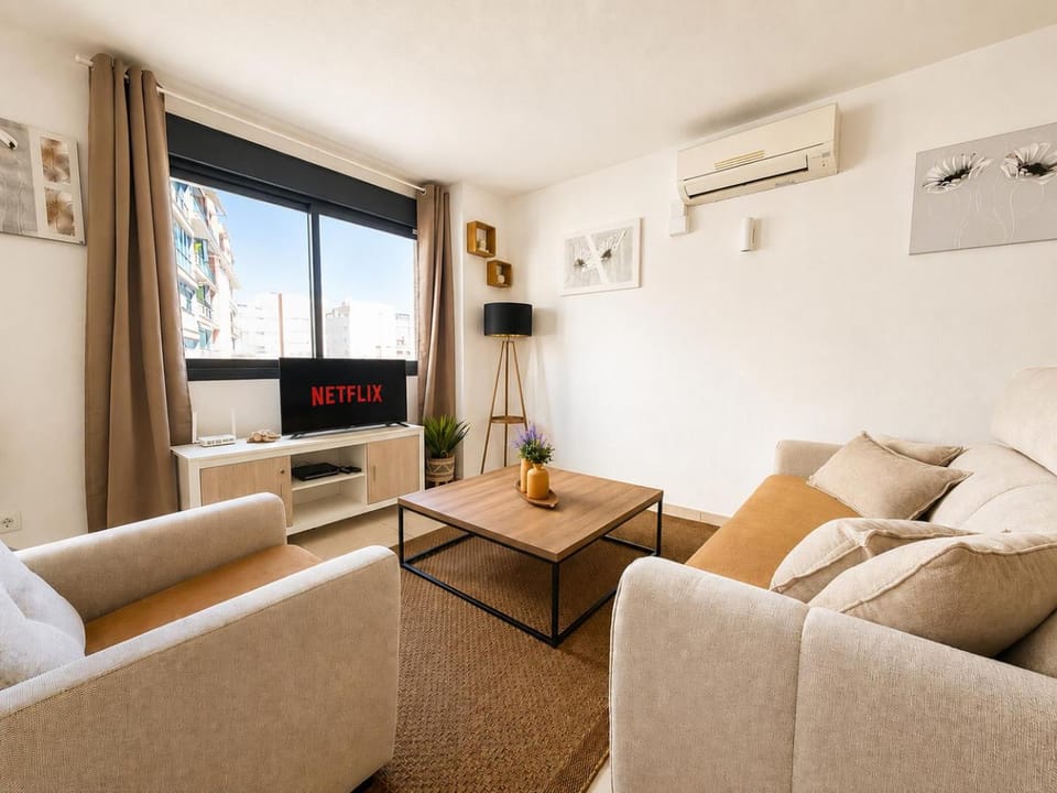 Bed, TV and multimedia, Living room, Lounge or bar, Seating area, Mountain view, Pool view, Sea view, furniture, internet, air conditioner
