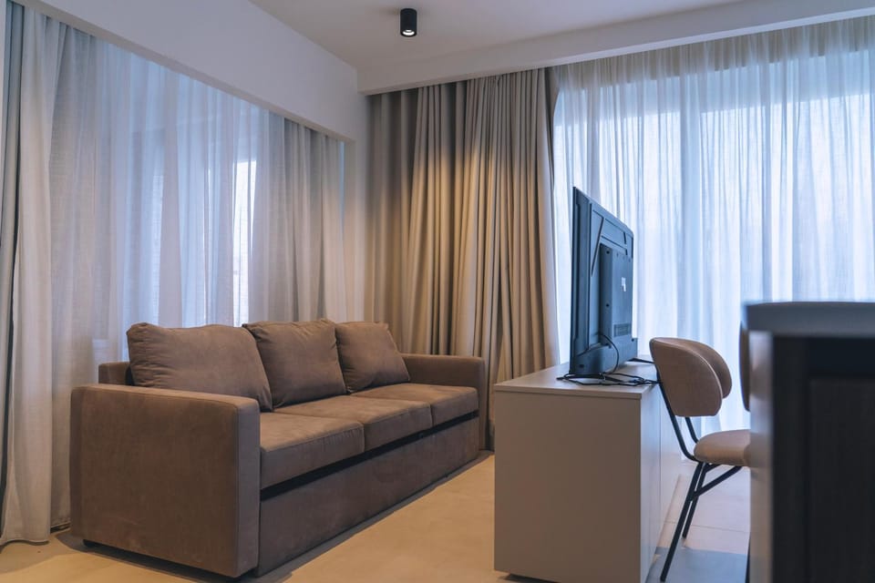 Water's Edge Suite Xlendi Direct Seafront with Private Roof Top Jacuzzi Apartment in Munxar