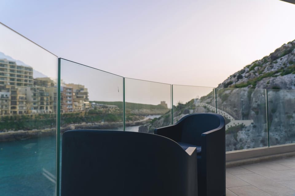 Water's Edge Suite Xlendi Direct Seafront with Private Roof Top Jacuzzi Apartment in Munxar