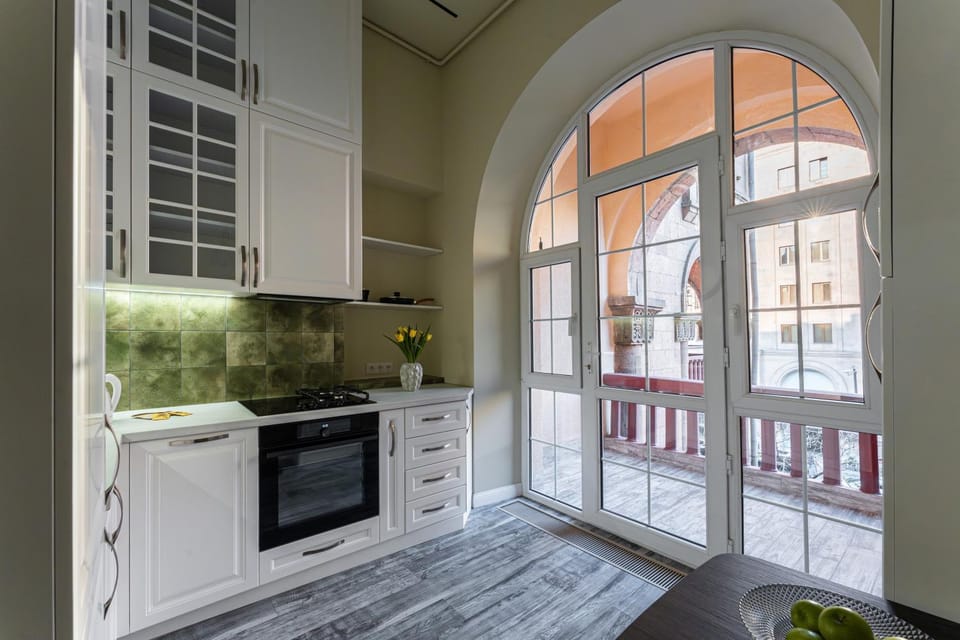 Kitchen or kitchenette, dishwasher, oven, stove