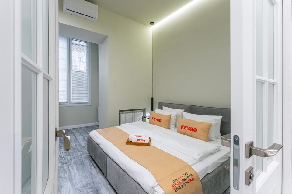 Bed, Bedroom, towels, wardrobe, air conditioner