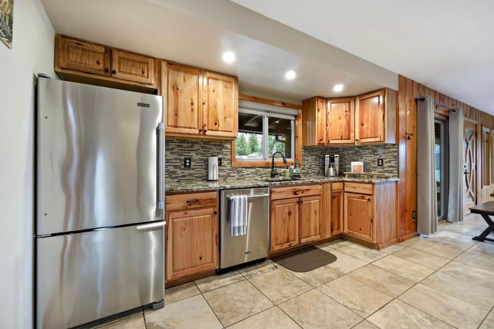 Kitchen or kitchenette, dishwasher, oven, stove, toaster