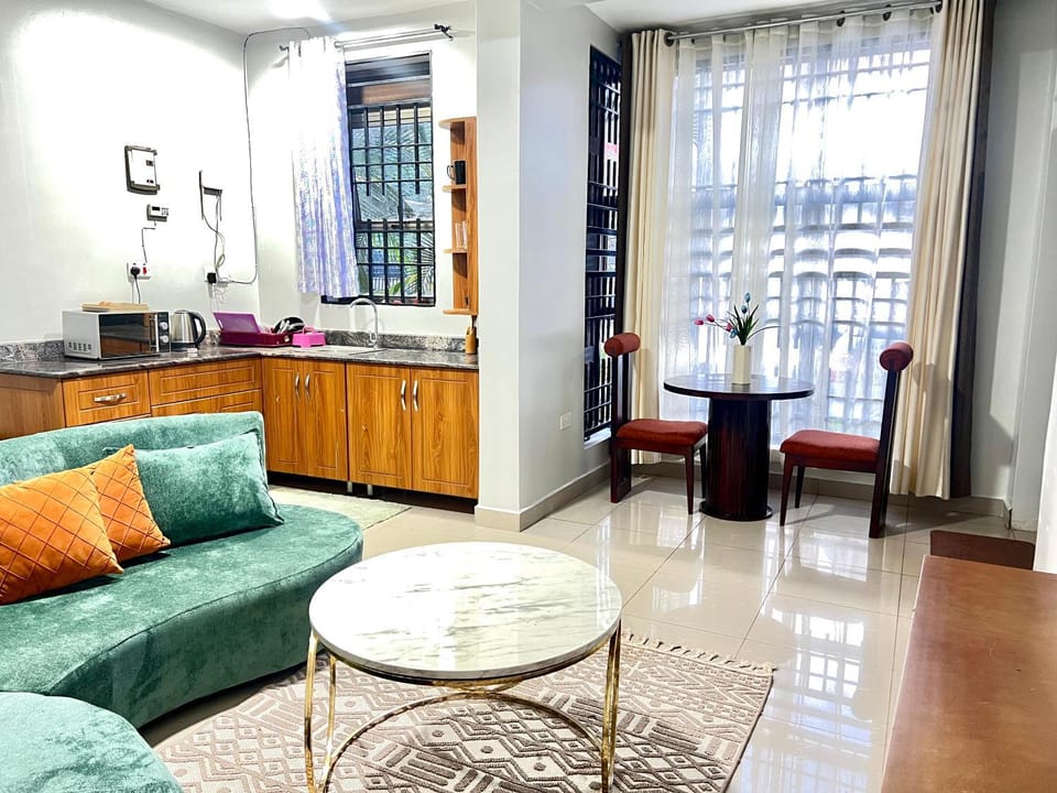 Kitchen or kitchenette, Living room, Seating area, Dining area
