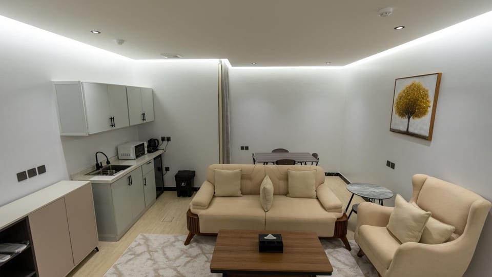 Kitchen or kitchenette, Living room, Seating area, stove