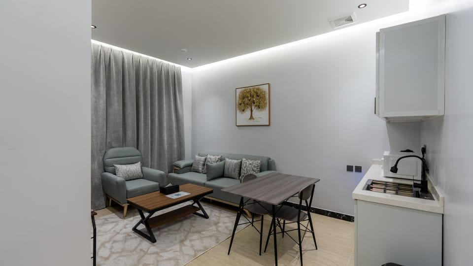 Kitchen or kitchenette, Living room, Seating area, Dining area