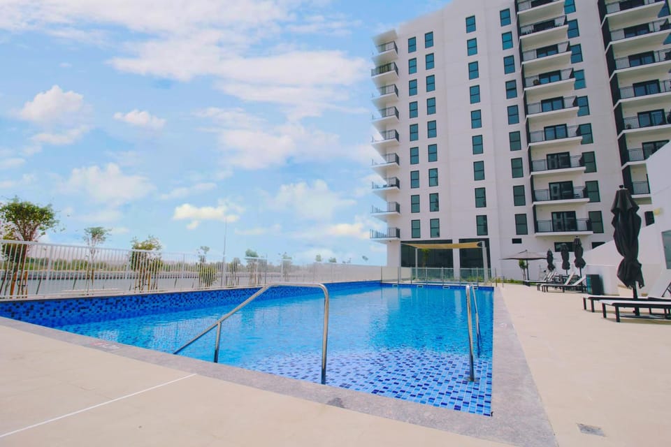 Classy Modern Studio Canal and Pool View Apartment in Abu Dhabi