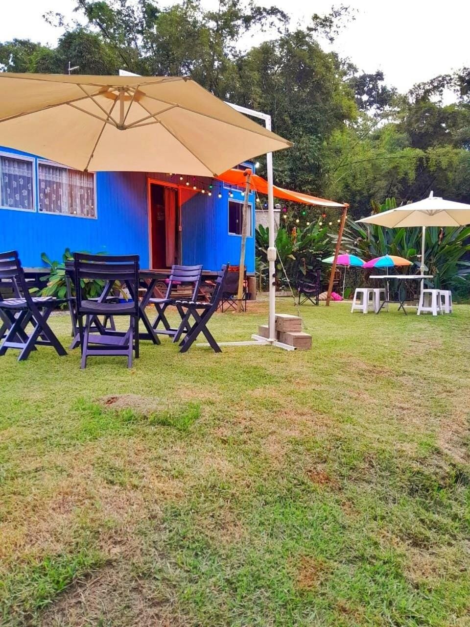 Property building, Patio, Dining area, Garden view